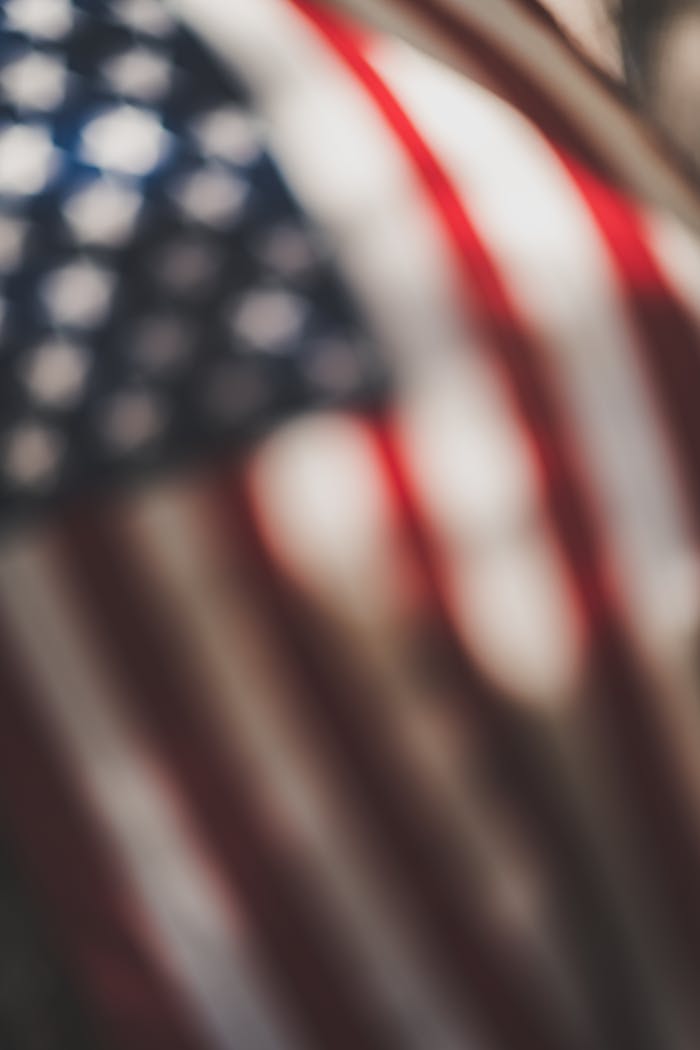 Services-02 Artistic blurred close-up of the USA flag, evoking patriotism and symbolism.